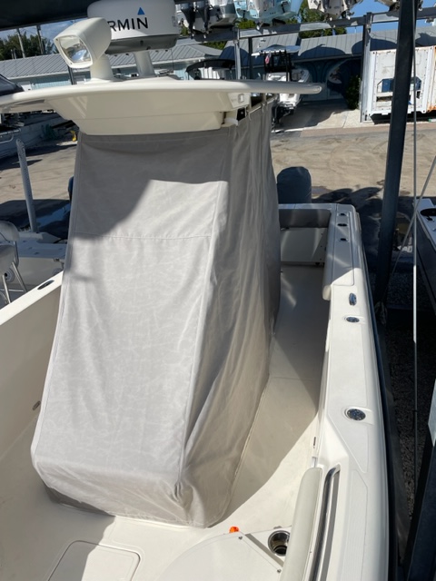 Custom boat t-top canvas enclosure installation on fishing boat