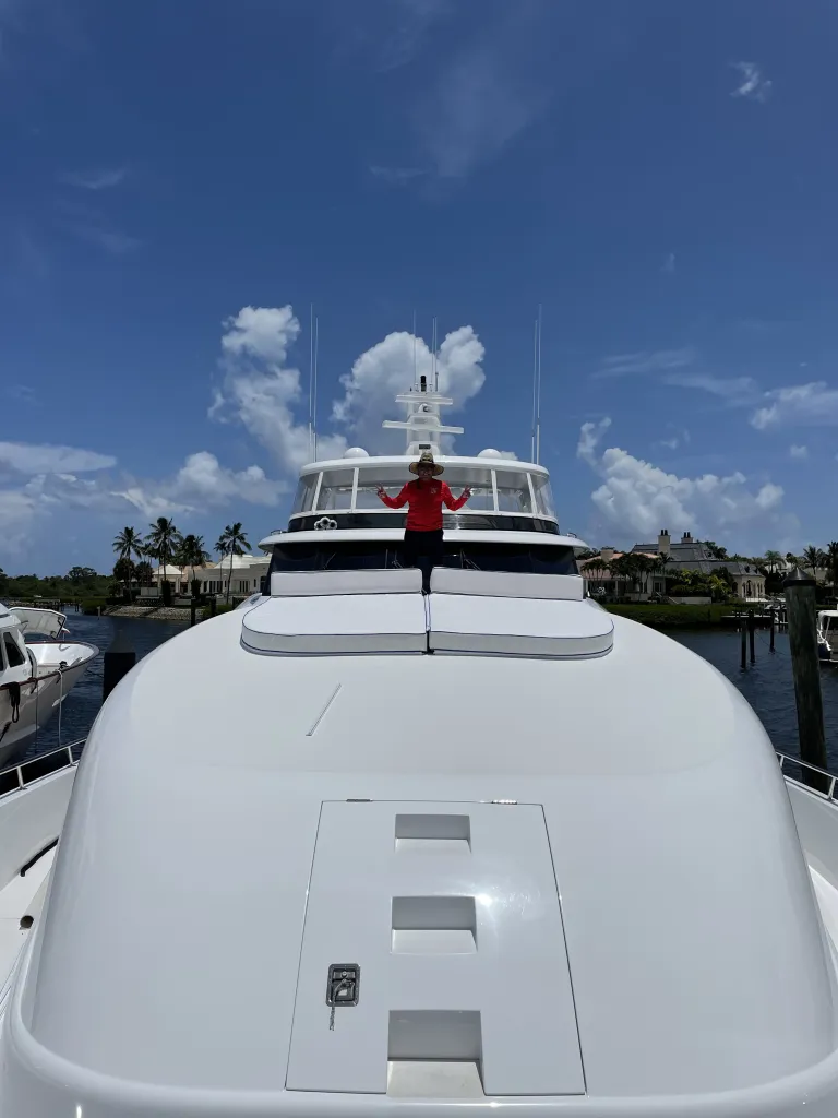 Custom yacht bow cushions with blue and white striped marine upholstery